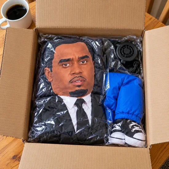 DiddyGrab costume packed in its delivery box with the fan
